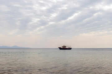 Fishing Adventures: Fisher in Small Boat at Sea in Tunisia, North Africa