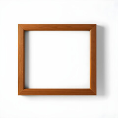 Empty wooden picture frame hanging on white wall