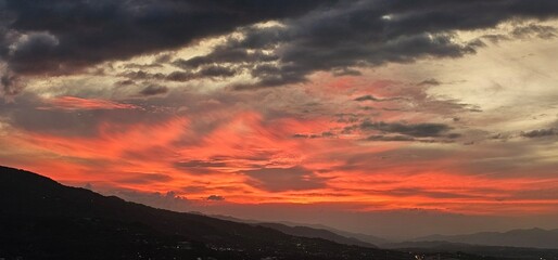 Fiery Sunset Over Mountains, Colorful Cloudscape
