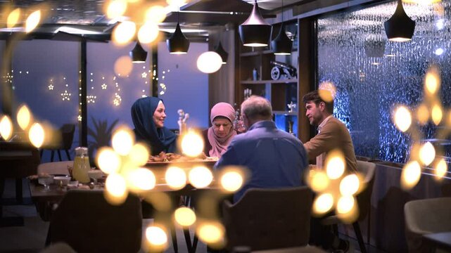 A diverse European Islamic family gathers together for iftar to break fasting during Ramadan, embracing cultural harmony and unity over Middle Eastern cuisine, warm lighting, Eid Mubarak dua time