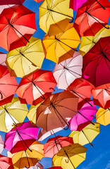 Colorful Umbrellas Hanging As Street Decoration And Sun Protection In The City Of Bordeaux, France