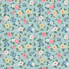 Vintage seamless floral pattern. Ditsy style background of small daisy flowers. Small blooming flowers scattered over a gray blue background Stock vector for printing on surfaces and web design
