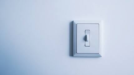 A light switch isolated against a white background