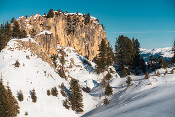 Alpine landscape with a peak, snow and clear, no clouds, beautiful colors at the top of a mountain