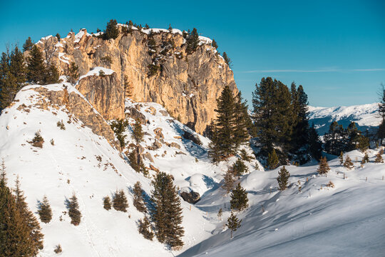 Alpine landscape with a peak, snow and clear, no clouds, beautiful colors at the top of a mountain