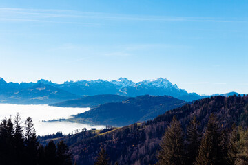 Obraz premium Alps with fog in the valley in Switzerland