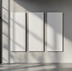 Mockup of three long blank canvases on minimalist wall