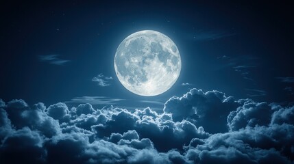 Full moon rising over clouds at night