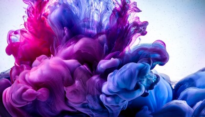Obraz premium Close-up of a nebula-inspired ink swirl in water, with deep purples, blues, and pinks blending together, creating a cosmic, ethereal look with swirling, vibrant colors.
