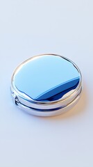 Elegant Round Silver Compact Mirror with a Glossy Blue Surface for Beauty and Fashion Accessories