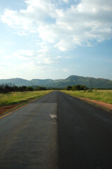 straight road between fields