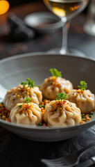 Artistic serving of Polish dumplings on sleek restaurant table, gourmet dining