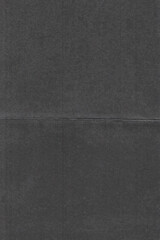 high res scan of black paper with deep folding marks. cool print overlay.