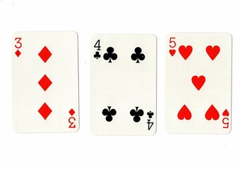 A hand of playing cards showing a run of three on a white background.
