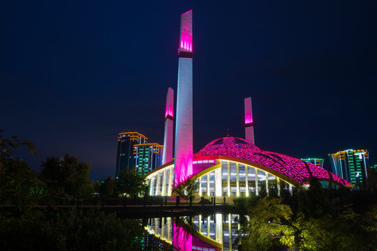 ARGUN, RUSSIA - SEPTEMBER 28, 2021: Modern mosque "Mother's Heart" (dedicated to Aimani Kadyrova) in the night landscape