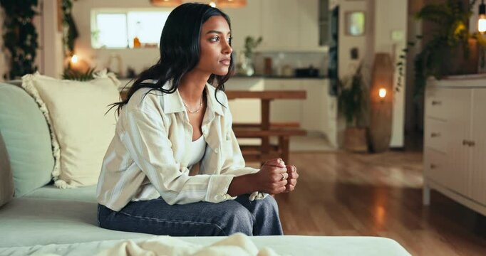 Sad, woman and stress on sofa at house with anxiety of trauma memory, mental health and mistake reflection. Female person, thinking and choice for broken heart, depression and ptsd crisis of bad news
