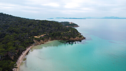 Aerial drone view of the island of Porquerolles with turquoise waters