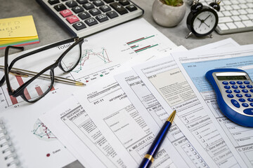 Pit 38 37 form, annual tax return with pen calculator on desk. Time for tax