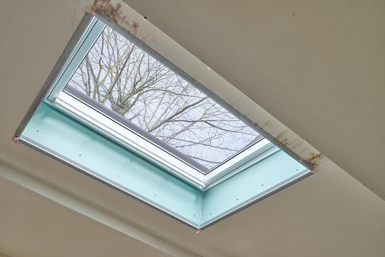 Repair and fixing  etaps of water damage on roof windows in Attic