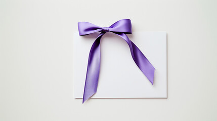 A romantic blank card with a soft ribbon tied in the corner