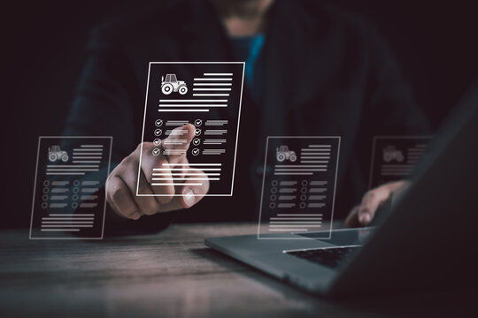 businessman uses laptop, interacting virtual document interface, representing digital data management, automation, online record processing for efficient business operations and workflow optimization.