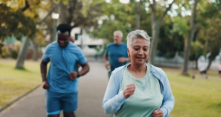 Senior, group and running with personal trainer at park for cardio workout, training or health and wellness. Mature, fitness or elderly runners with smile or coach for sprint, jog or race in nature