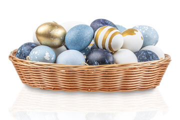 Multi colors Easter eggs in the basket isolated on white background
