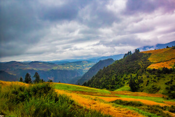 Dramatic clouds form between mountains in Yunnan province, China
