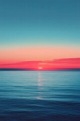 Naklejka premium Tranquil sunset over calm ocean waters