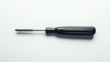 A single screwdriver, showcasing simplicity and precision in design.
