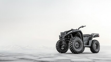Sleek black ATV with aggressive tread tires, isolated, built for extreme terrain