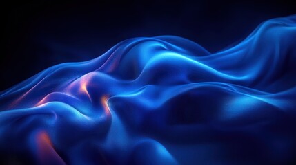 Obraz premium Abstract dynamic blue fabric folds, dark background, glowing light. Possible use technology, fashion, design