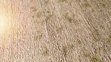 Clear aerial view of prepared farmland showing plowing patterns