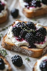 Close-up photo of a rustic blackberry and cream cheese toast, featuring a thick slice of artisanal golden-brown bread with a crispy crust.  