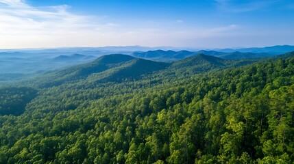 Naklejka premium A breathtaking aerial view of lush green mountains under a bright blue sky : Generative AI