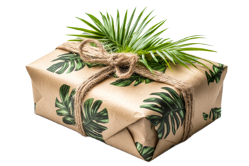 Gift wrapped in tropical leaf print with greenery
