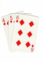 A hand of playing cards showing a run of three on a white background.