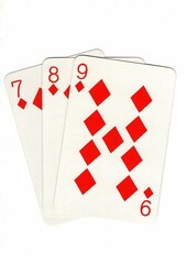 A hand of playing cards showing a run of three on a white background.