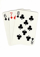 A hand of playing cards showing a run of three on a white background.