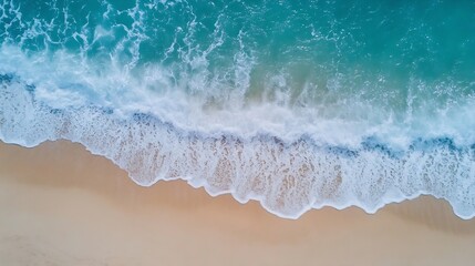 Stunning aerial view of ocean waves crashing onto the sandy beach creating a vibrant seaside landscape : Generative AI