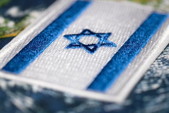 Embroidered flag of Israel. Symbol of the country. Middle Eastern countries, close up - Powered by Adobe