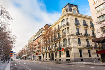 Neoclassical buildings on Calle Serrano in a luxury shopping area and offices of multinational companies, Madrid