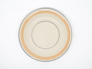 photo with a view from above the surface of a small plate usually used as a cup coaster or as a small food plate