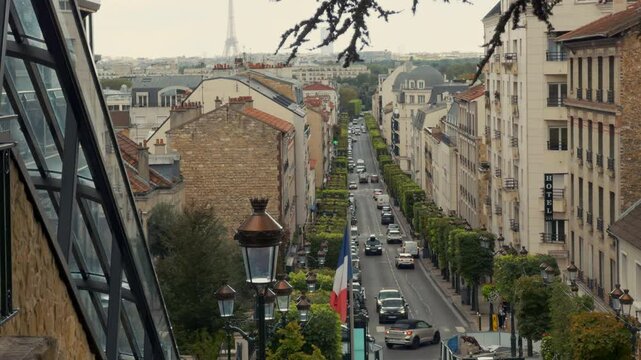 Scenic Parisian Street with French Flag and Traffic