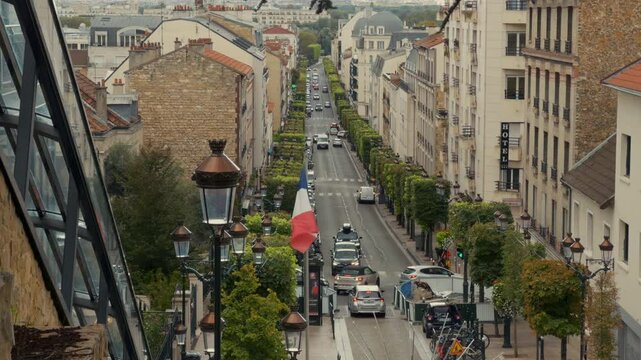 Parisian Street with French Flag and Traffic