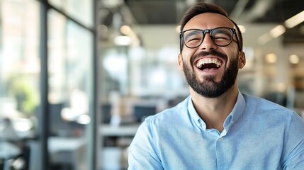 Obraz premium Cheerful man laughing joyfully in a bright office setting with contemporary decor and natural light : Generative AI