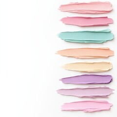 A collection of pastel paint strokes in soft colors is displayed horizontally on a clean white background, showcasing artistic creativity and color blending options for inspiration