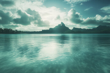 Stunning shallow tropical water with vibrant coral reefs and lush green mountains in the background

