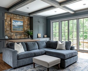 Obraz premium The spacious living room contains a gray sectional sofa and ottoman