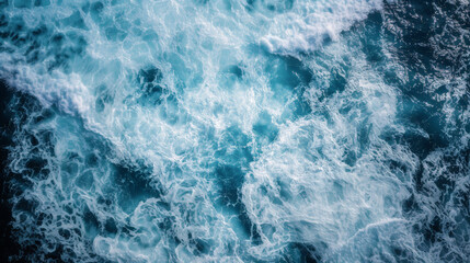 Beautiful aerial view of ocean waves with white foam in the turquoise sea, flat lay